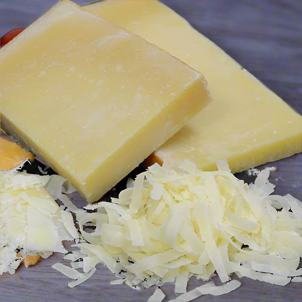 2 squares of sbrinz cheese, a yellow/white paste, with hard shredded pieces resembling parmigiano