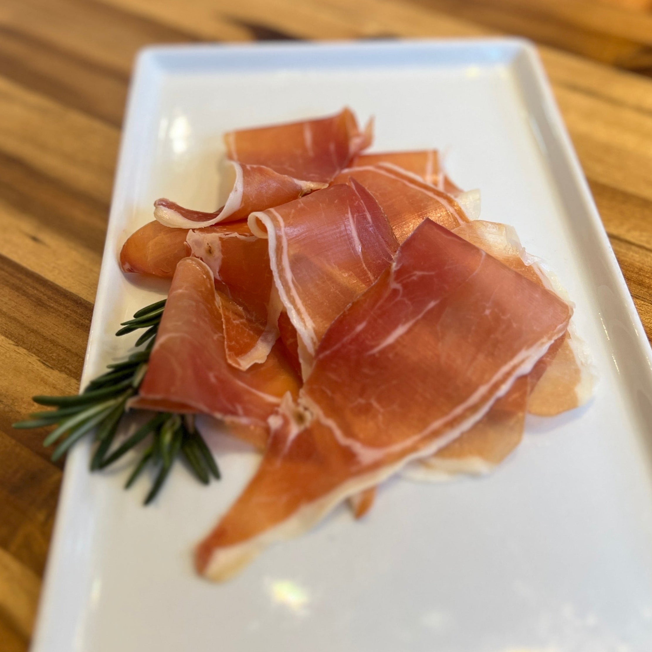 From Italy, this is a whole muscle meat cut that is lightly smoked while being cured.