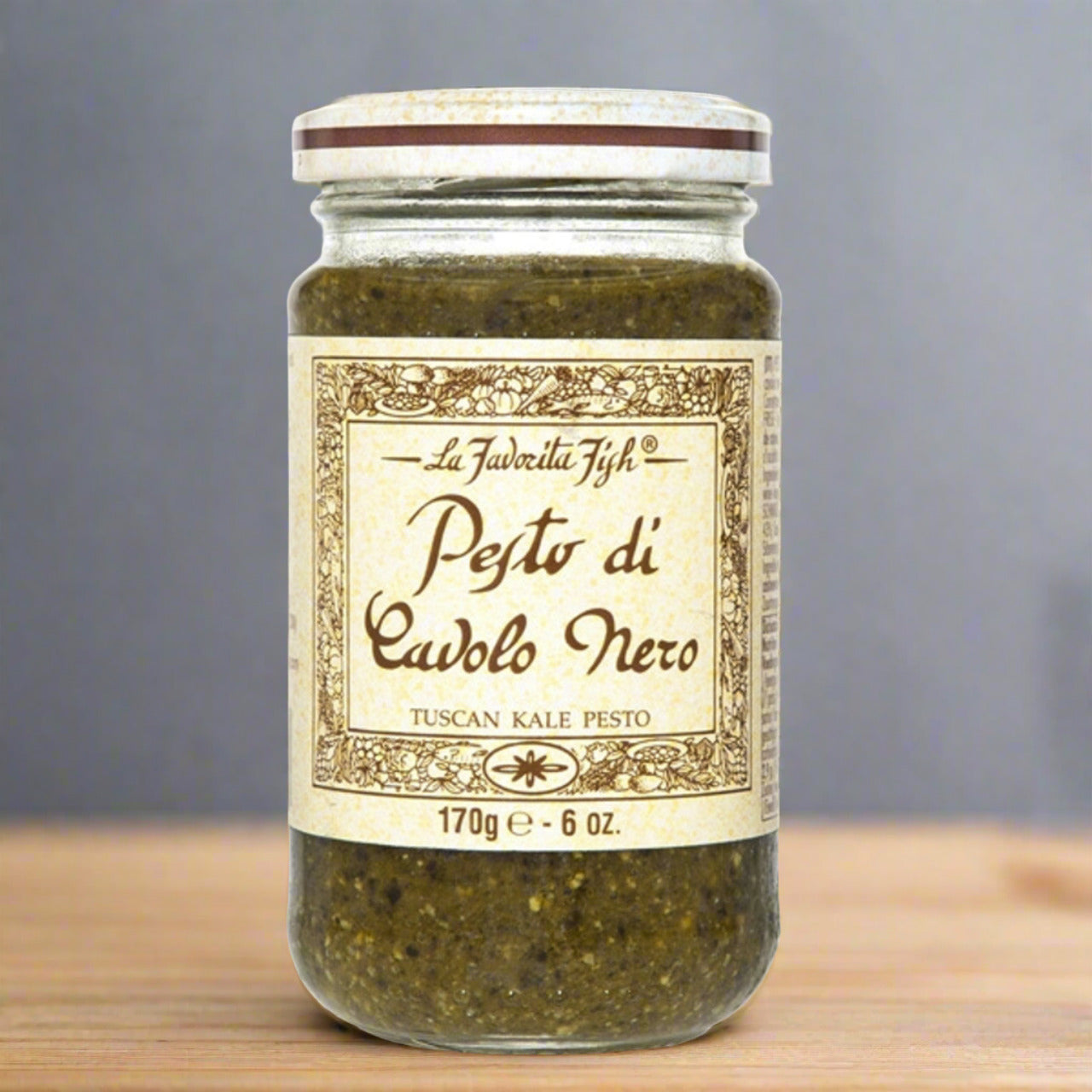 glass jar of pesto, front facing, with ivory label