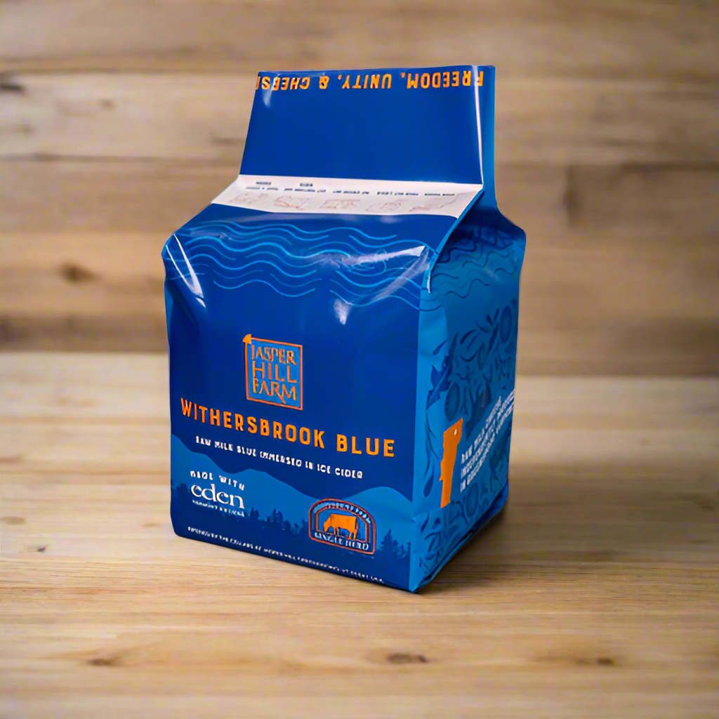 retail package of whole block wheel of withersbrook, in a blue bag.